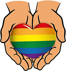 pride heart held in hands