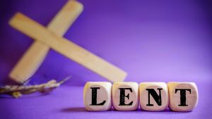 The word LEnt with a cross in the background